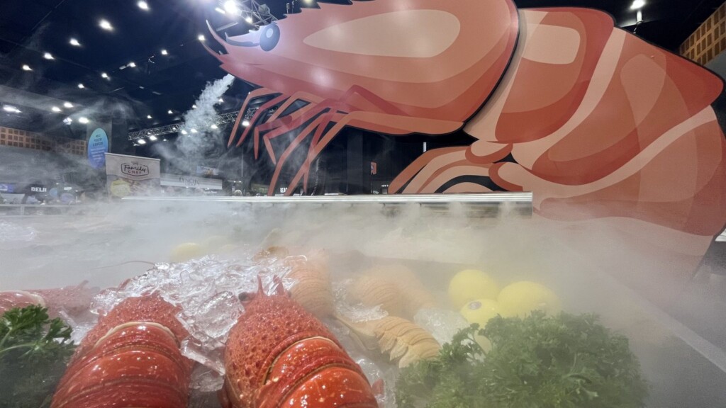 fresh seafood and lobster in a cold section of a super market